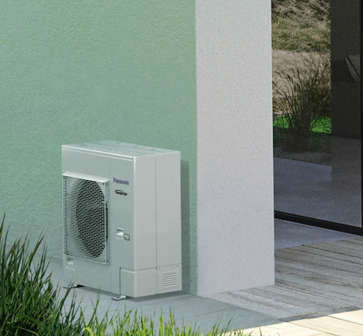 Outdoors Air-conditioner external unit on white textured wall